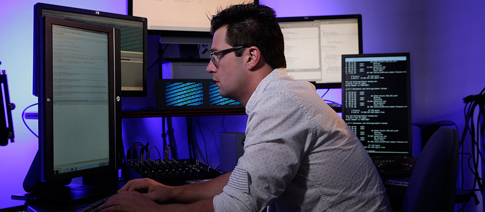 Student working on the computer for business technology