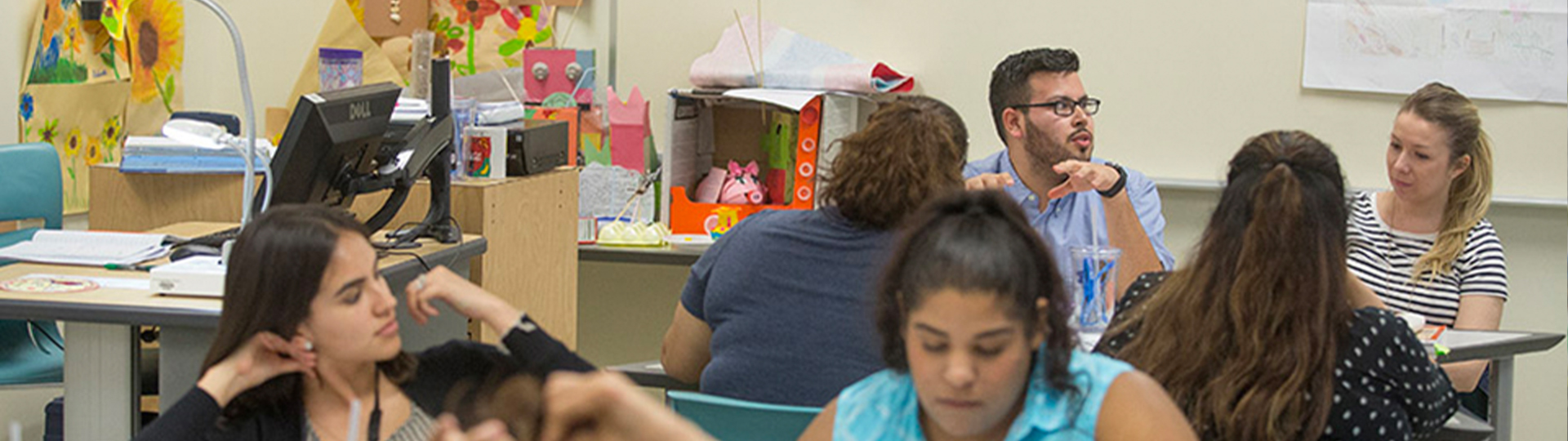 urban education students in classroom discussion