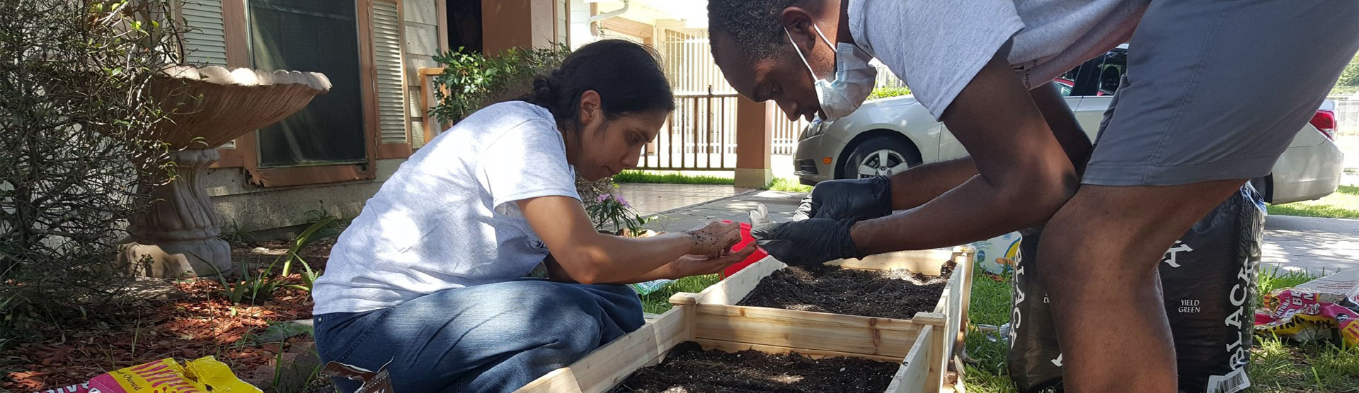 Two people gardening