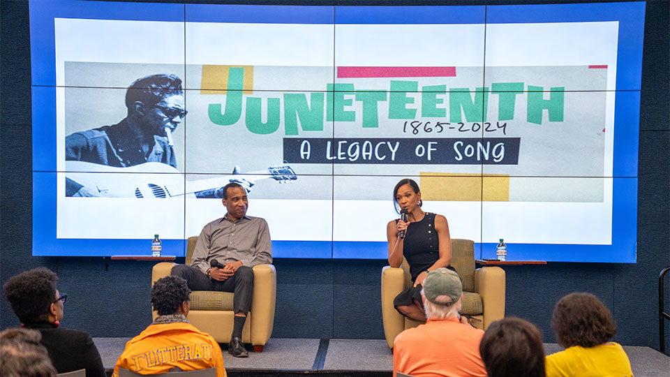 Len Cannon and Mia Gradney of KHOU11 on stage discussing documentary and Juneteenth