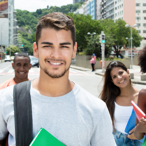 international student smiling at the camera