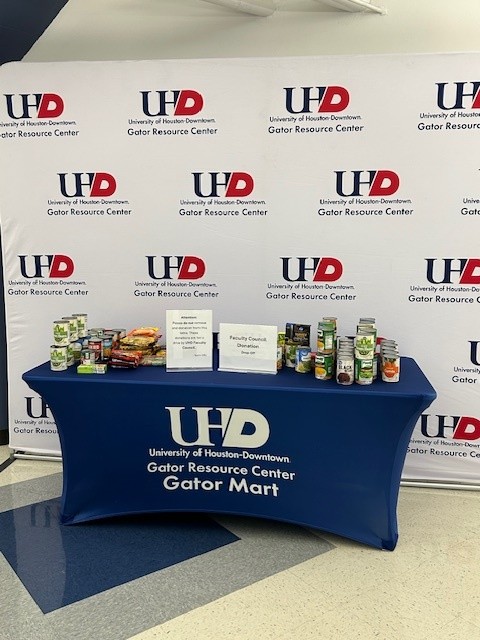 table with canned foods on top