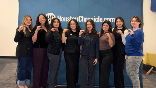Eight university students smile at the university of houston downtown. Text reads university of houston-downtown fall open house, saturday, october 25, 2025, 10 a.m.-1 p.m. website link is uhd.edu/openhouse