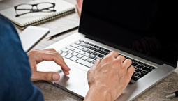 employee working on a laptop