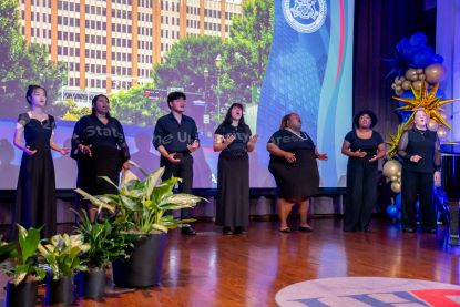 Concert chorale students sing at state of the university event