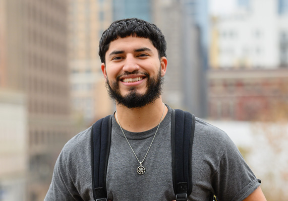 A male student smiling