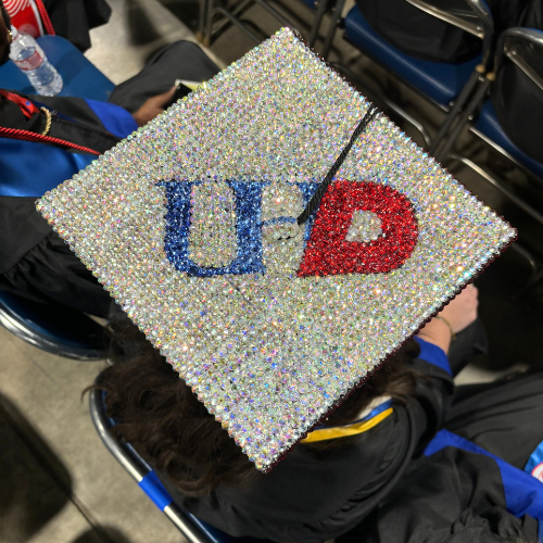 A mortarboard decoration with gems and 