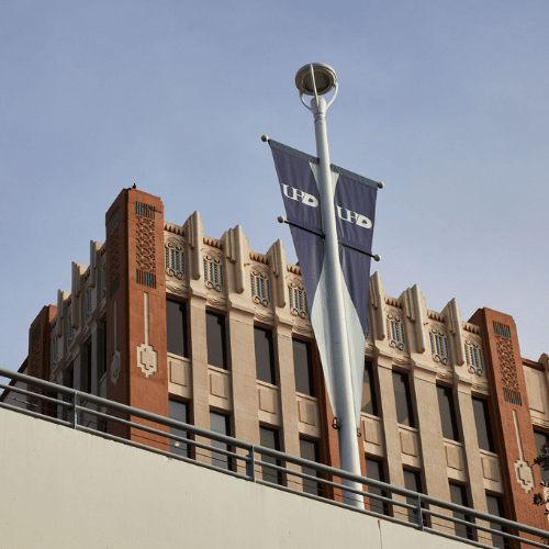 The University of Houston-Downtown's One Main Building and a banner 