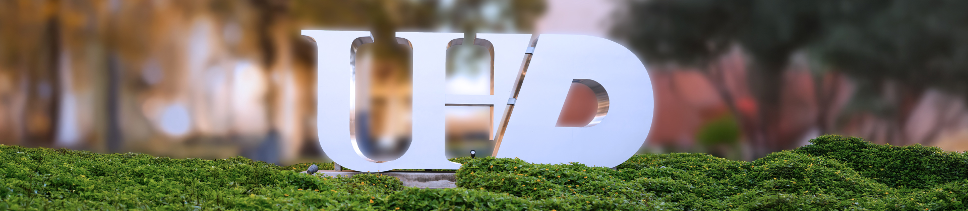 UHD logo sign