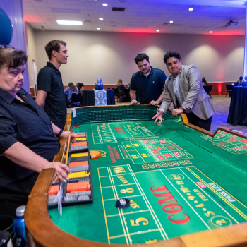 Students playing casino games at UHD One Main Event