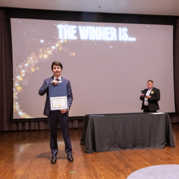 UHD student holds an award certification 
