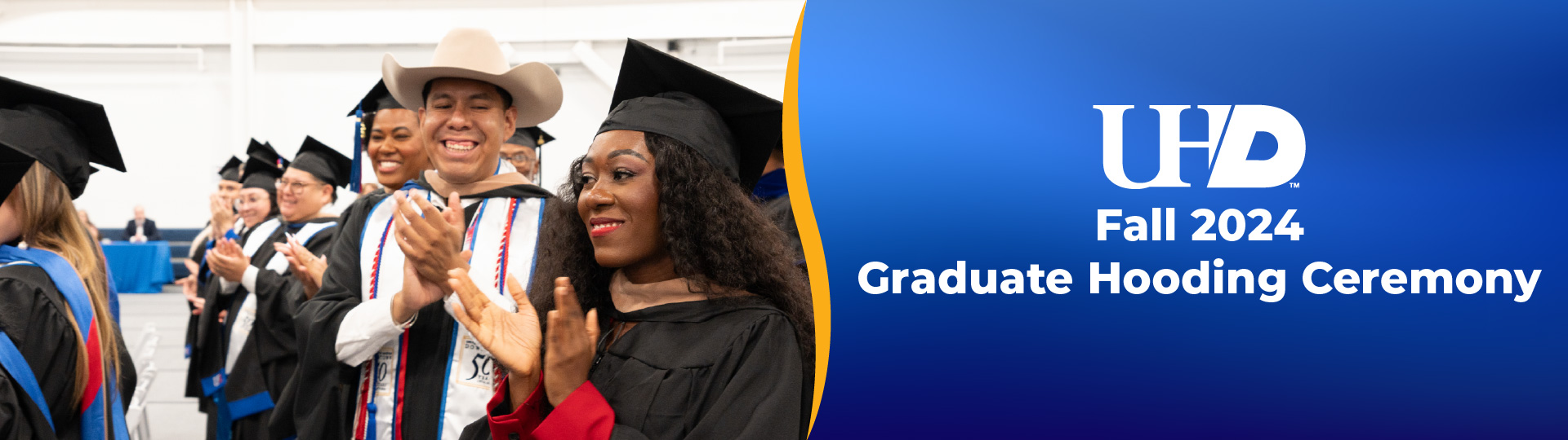 students celebrating at the hooding ceremony